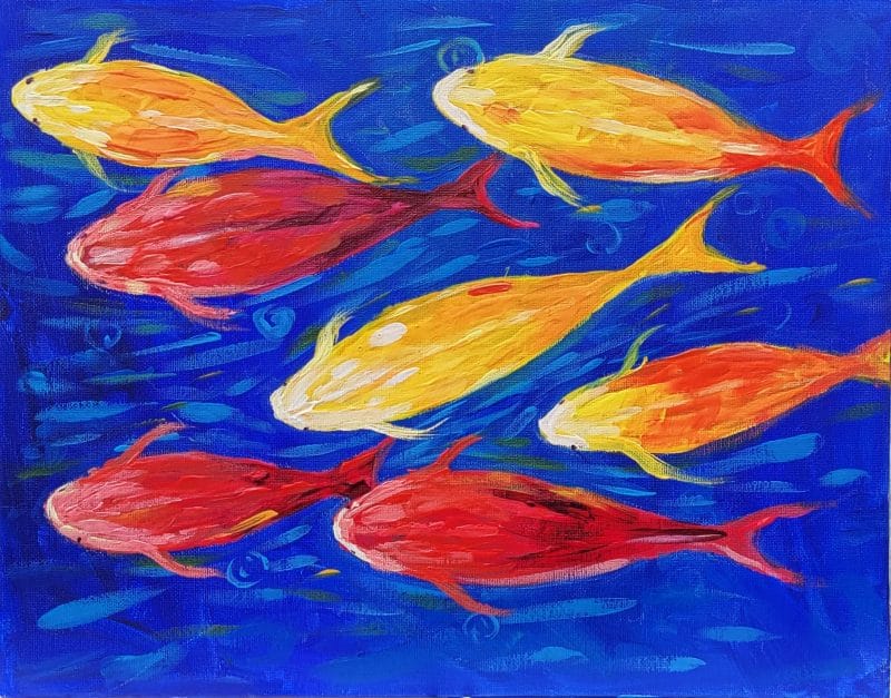 An exquisite painting of a vibrant school of yellow and orange fish, crafted at the best paint and sip in Washington DC.